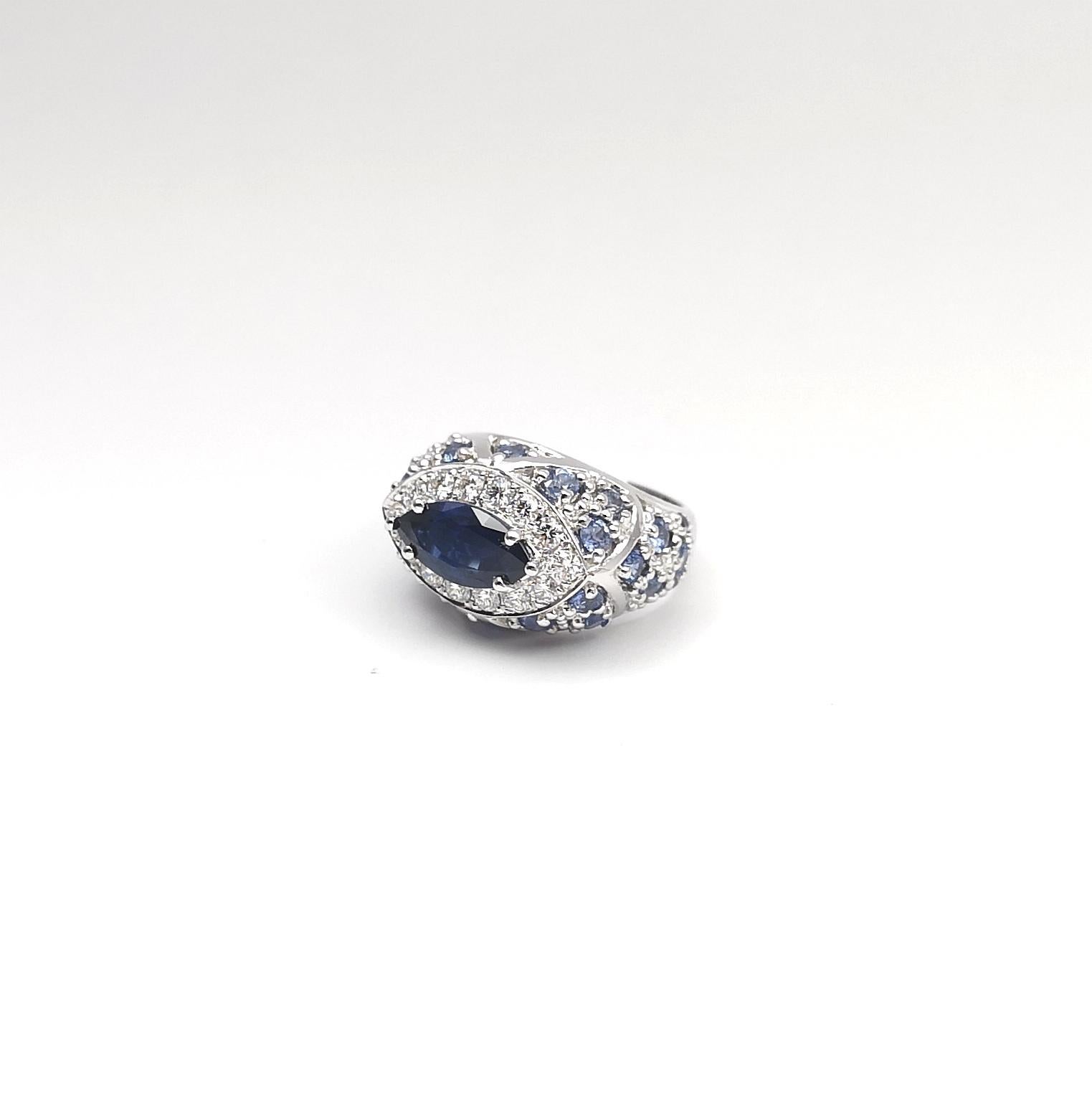 Blue Sapphire and Diamond Ring set in 18K White Gold Settings For Sale 5
