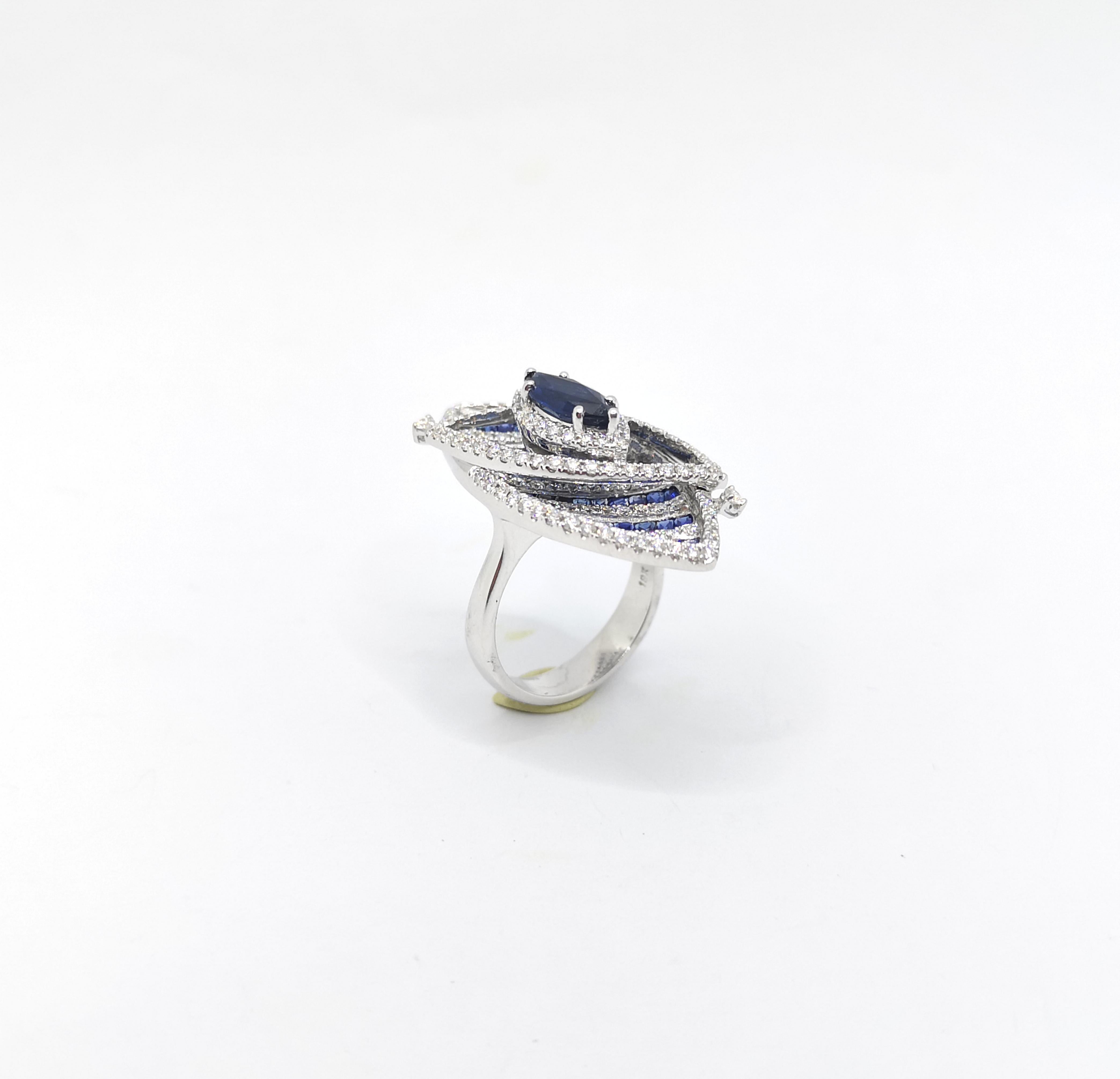 Blue Sapphire and Diamond Ring set in 18K White Gold Settings For Sale 6