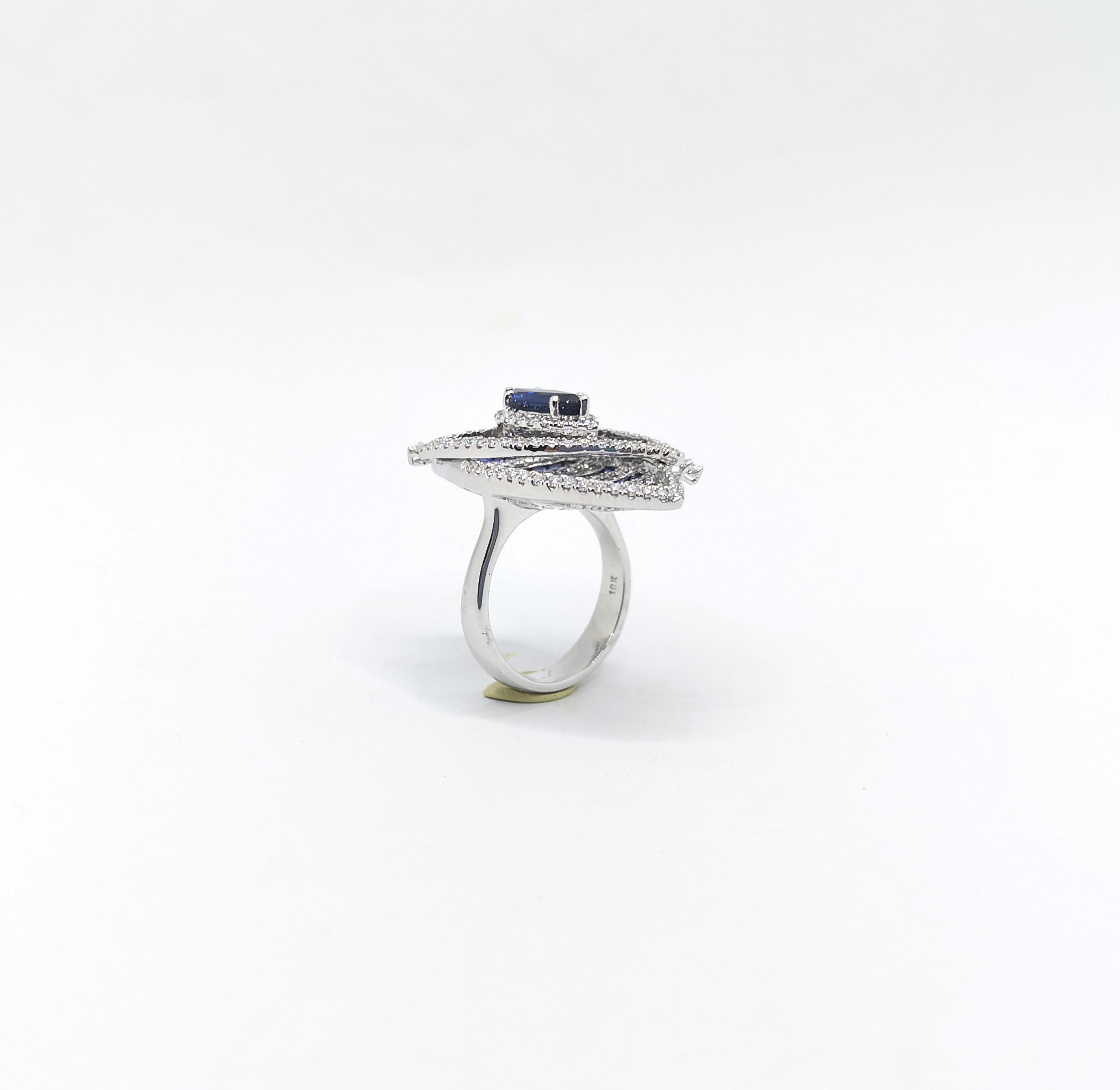 Blue Sapphire and Diamond Ring set in 18K White Gold Settings For Sale 7