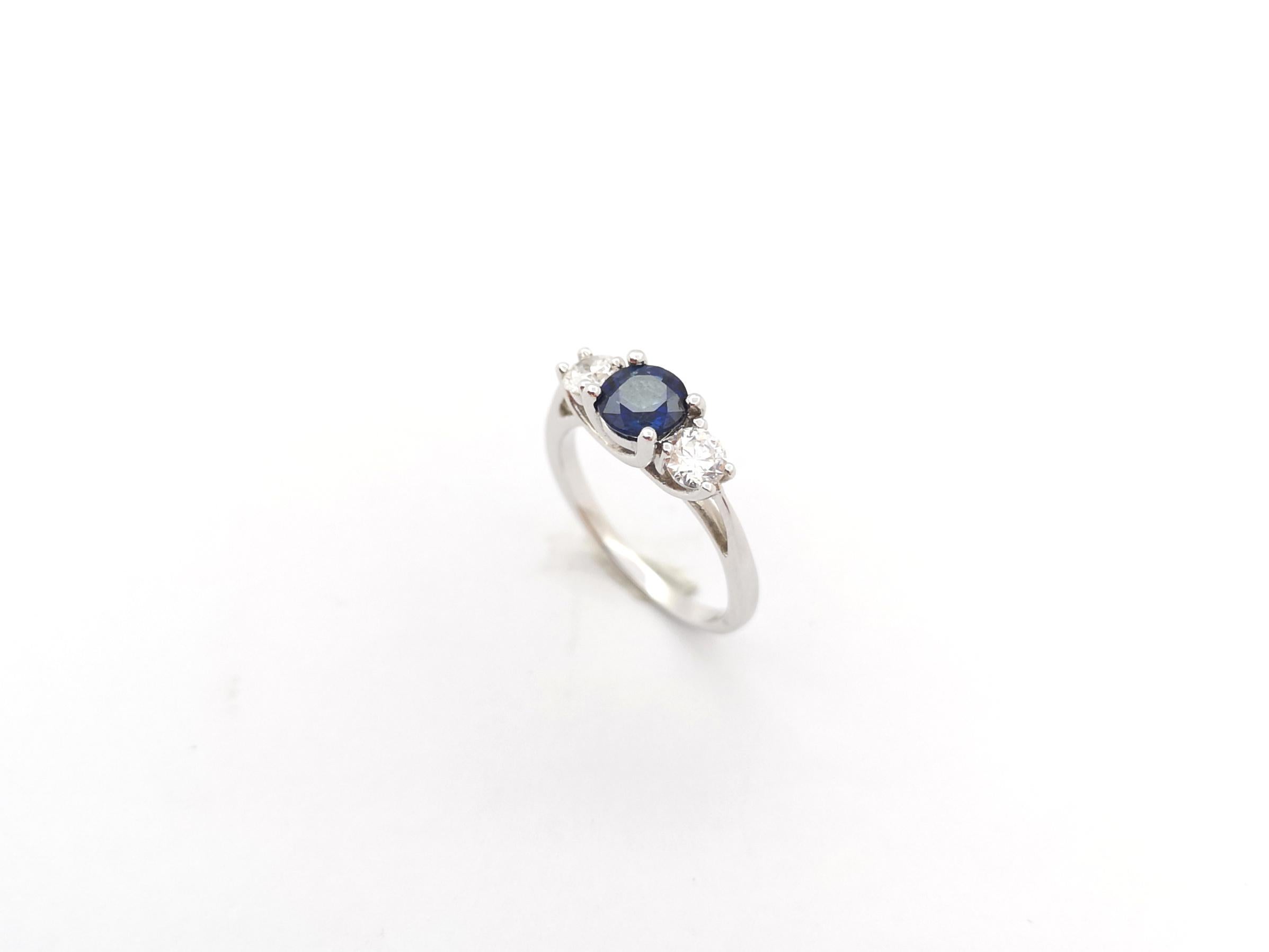 Blue Sapphire and Diamond Ring set in 18K White Gold Settings For Sale 9