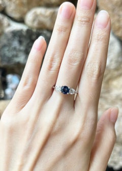 Blue Sapphire and Diamond Ring set in 18K White Gold Settings