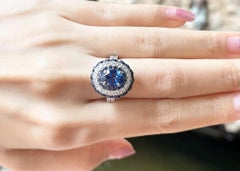 Blue Sapphire and Diamond Ring set in 18K White Gold Settings