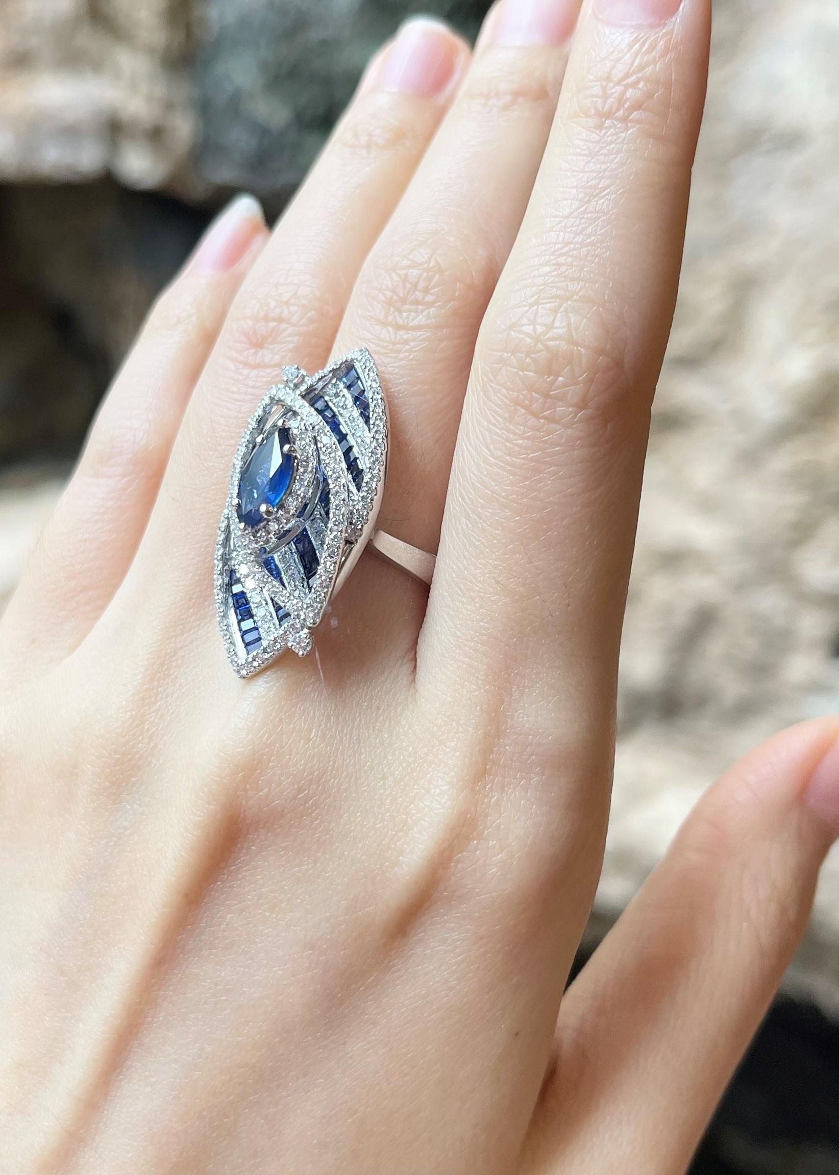 Blue Sapphire 1.45 carats, Blue Sapphire 2.05 carats and Diamond 2.02 carats Ring set in 18K White Gold Settings

Width:  1.6 cm 
Length: 3.4 cm
Ring Size: 54
Total Weight: 15.57 grams

