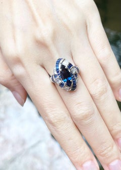 Blue Sapphire and Diamond Ring set in 18K White Gold Settings