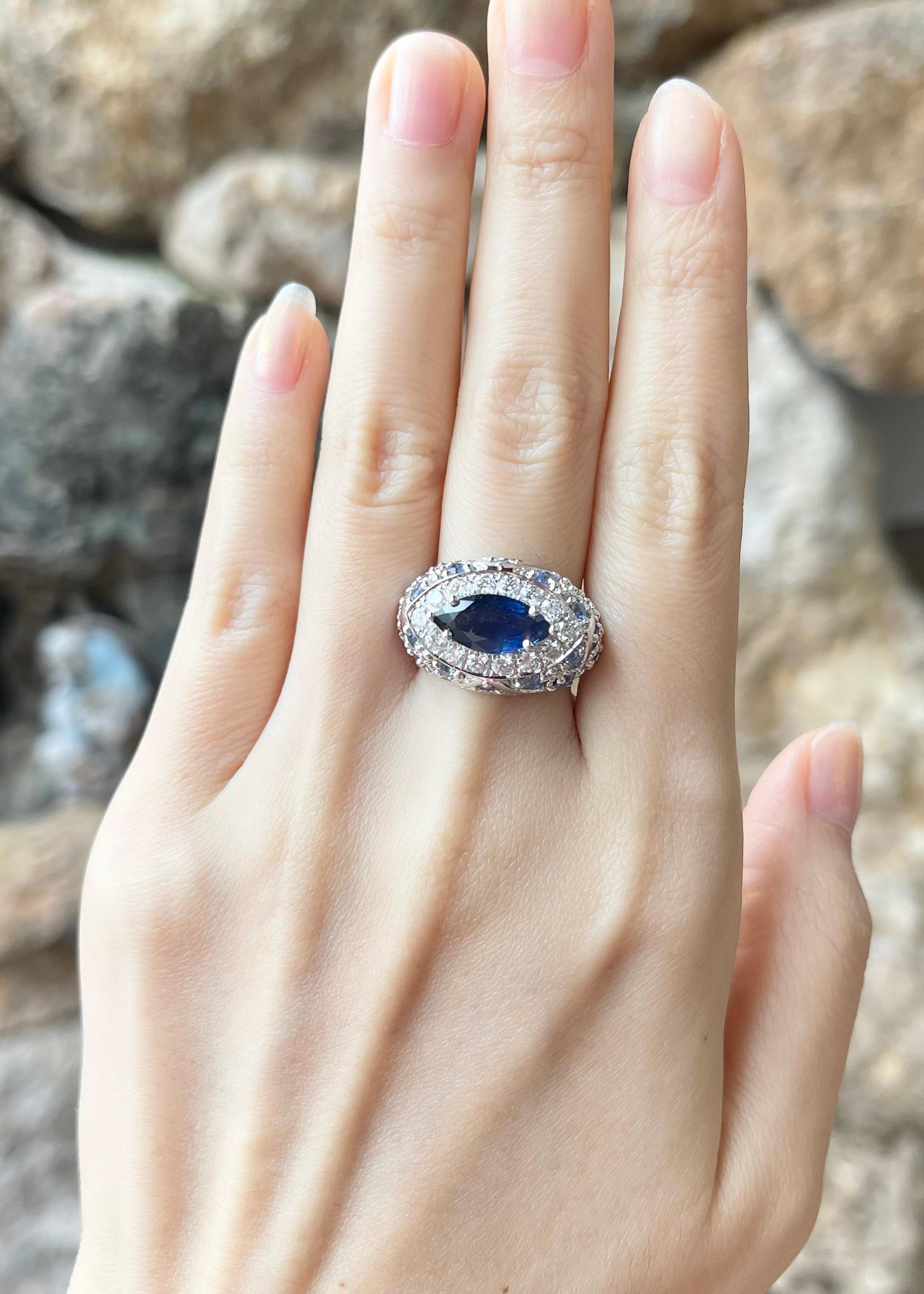Blue Sapphire 2.27 carats, Diamond 0.73 carat and Blue Sapphire 2.23 carats Ring set in 18K White Gold Settings

Width:  2.0 cm 
Length: 1.2 cm
Ring Size: 55
Total Weight: 15.42 grams

