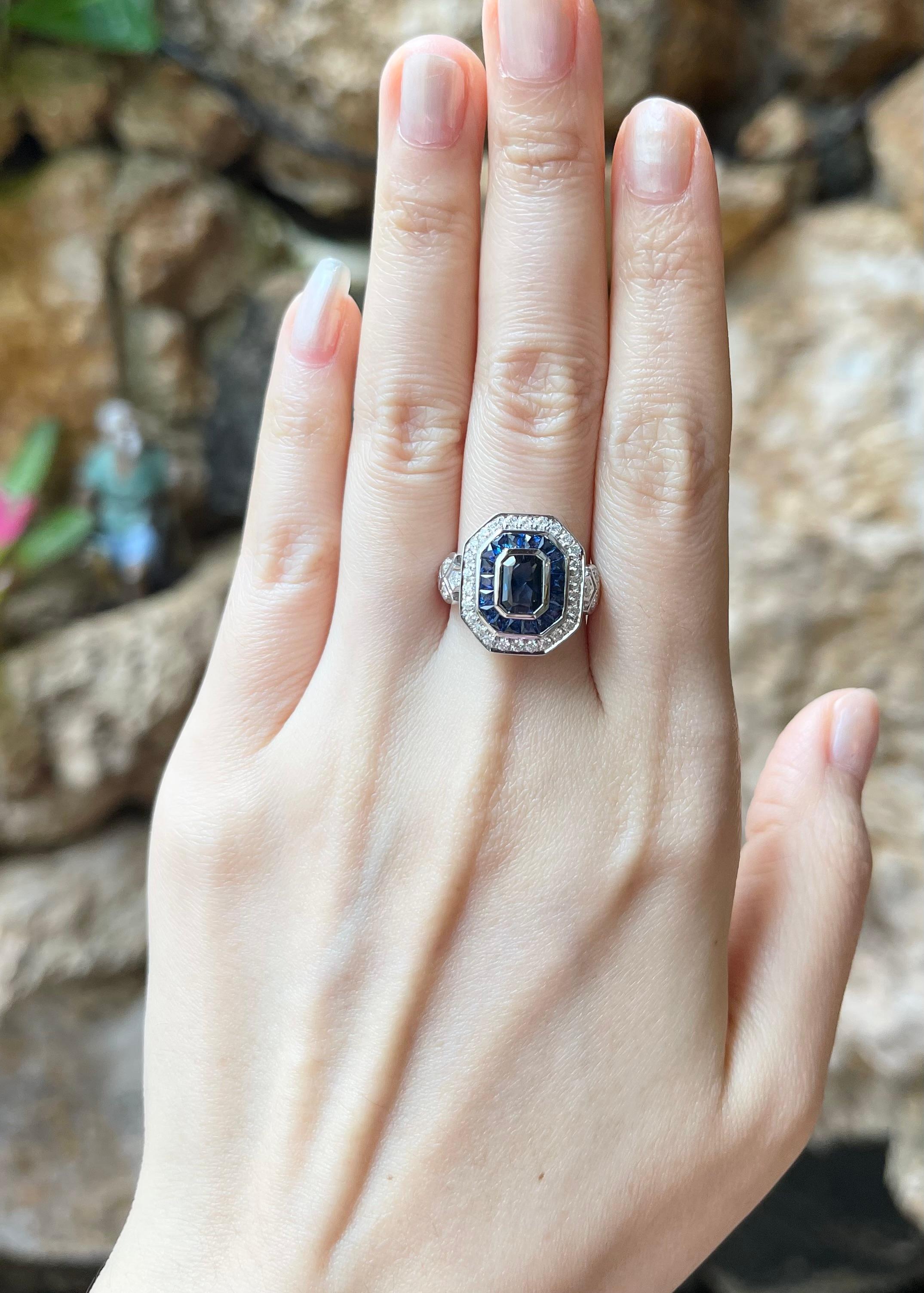 Blue Sapphire 0.86 carat with Blue Sapphire 1.17 carats and Diamond 0.63 carat Ring set in 18K White Gold Settings

Width:  1.5 cm 
Length: 1.8 cm
Ring Size: 54
Total Weight: 7.74 grams

