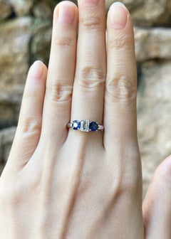 Blue Sapphire and Diamond Ring set in 18K White Gold Settings