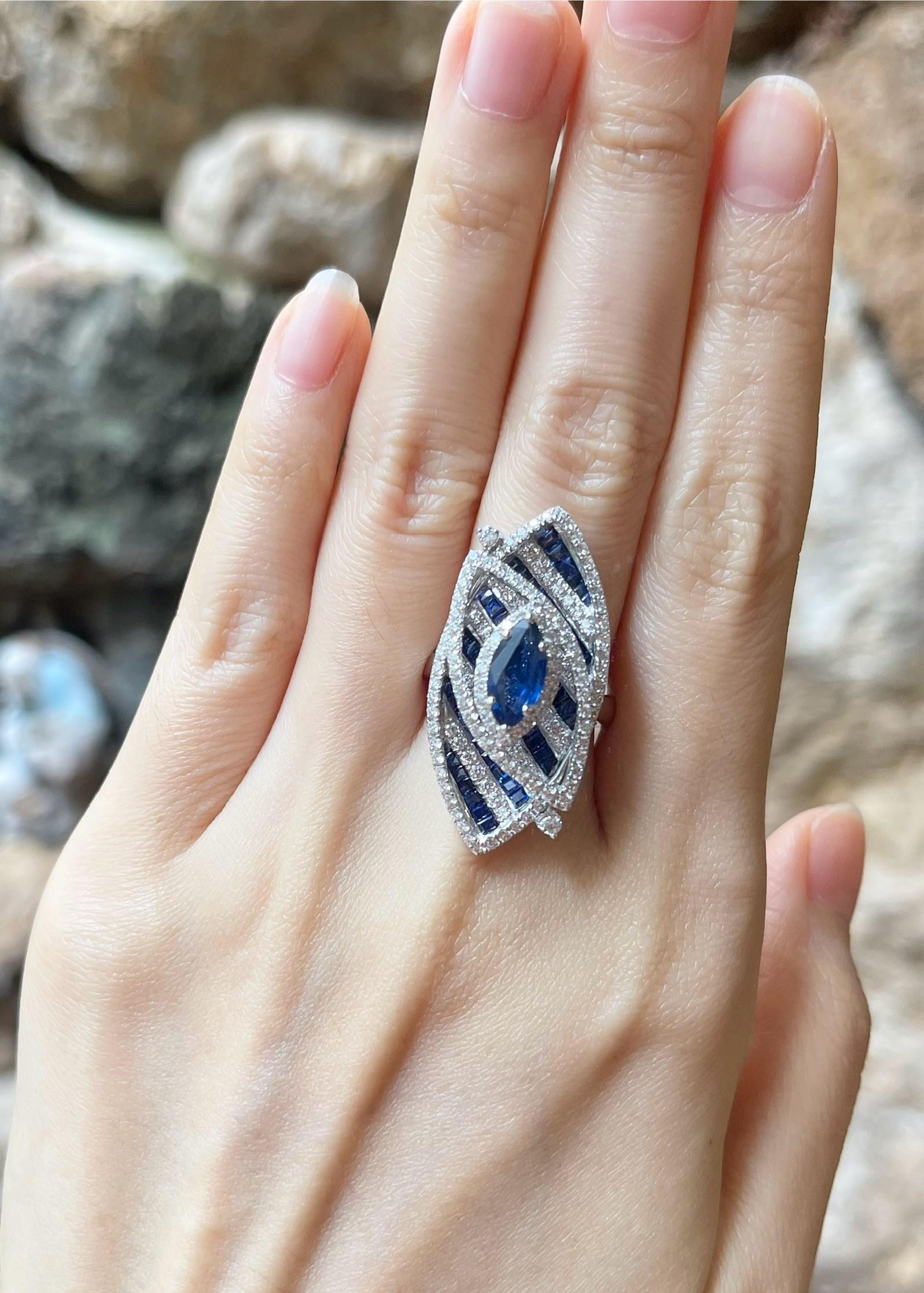 Women's Blue Sapphire and Diamond Ring set in 18K White Gold Settings For Sale