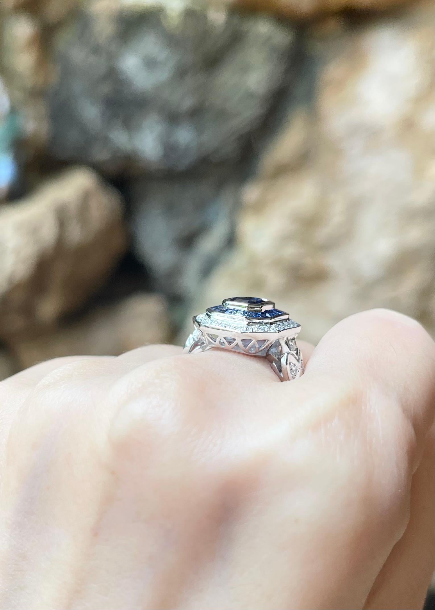 Women's Blue Sapphire and Diamond Ring set in 18K White Gold Settings For Sale