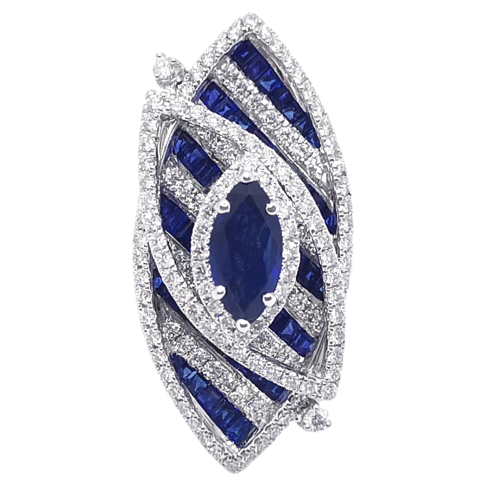 Blue Sapphire and Diamond Ring set in 18K White Gold Settings