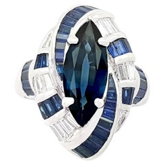 Blue Sapphire and Diamond Ring set in 18K White Gold Settings