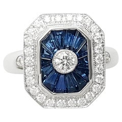 Blue Sapphire and Diamond Ring set in 18K White Gold Settings