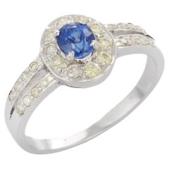 Blue Sapphire and Diamond Split Shank Engagement Ring in 18K White Gold