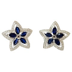 Blue Sapphire and Diamond Star Stud Earrings in 18 Karat White Gold