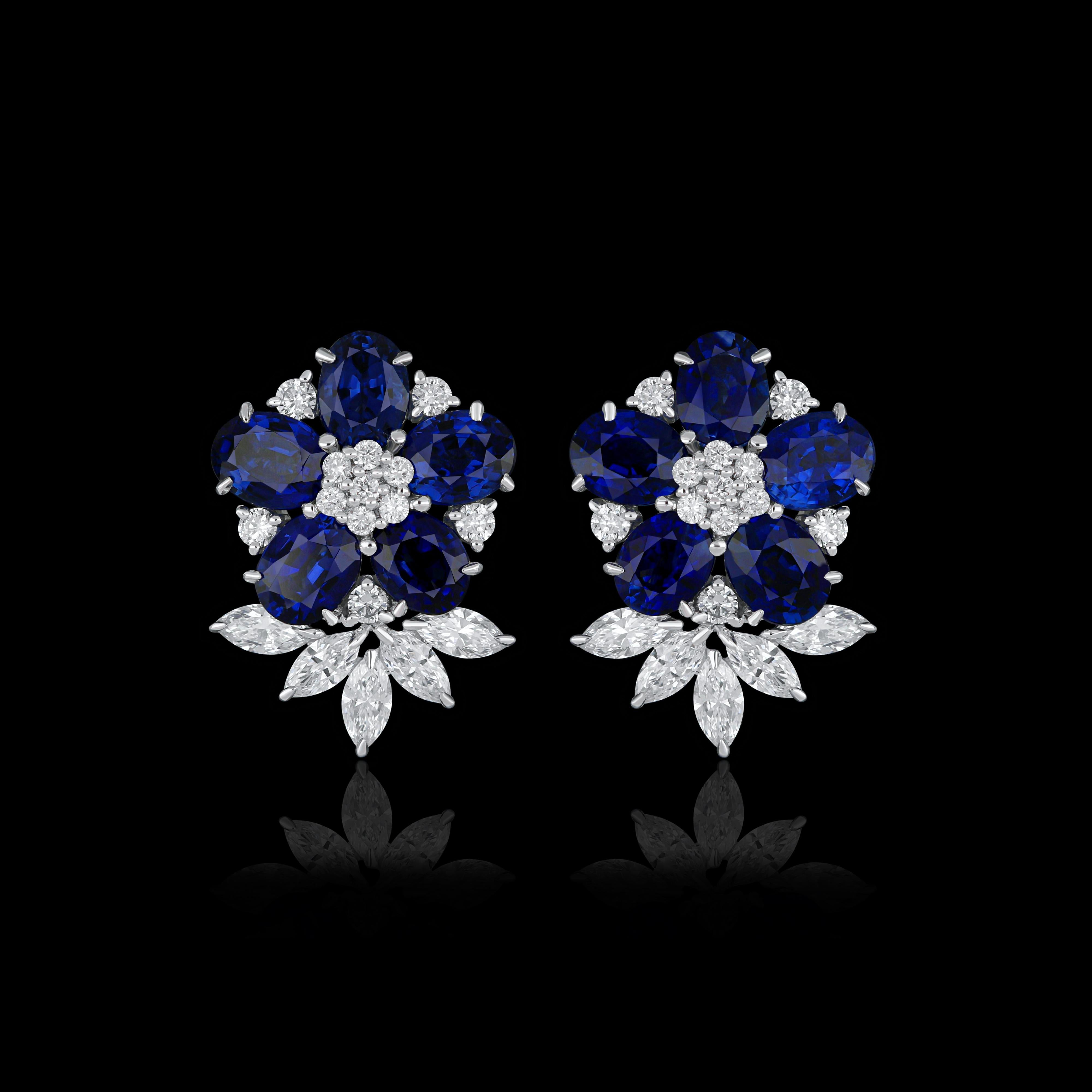 Elegant and exquisitely detailed 18 Karat White Gold Earring, center set with 4.45Cts .Oval Shape Blue Sapphire and micro pave set Diamonds, weighing approx. 1.02Cts Beautifully Hand crafted in 18 Karat White Gold.

Stone Detail:
Blue Sapphire: