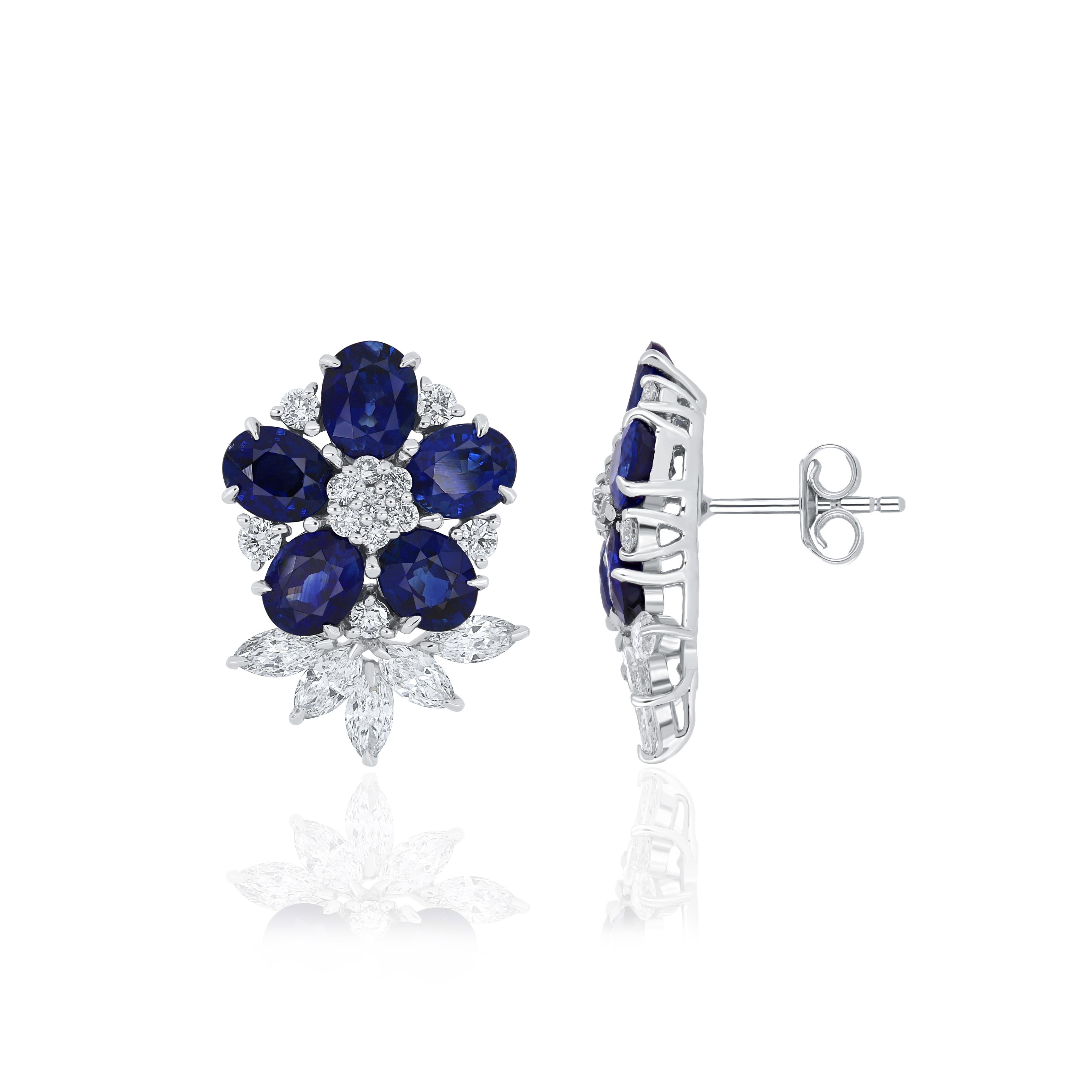 Oval Cut Blue Sapphire And Diamond Studded Earrings in 18 Karat White Gold For Sale