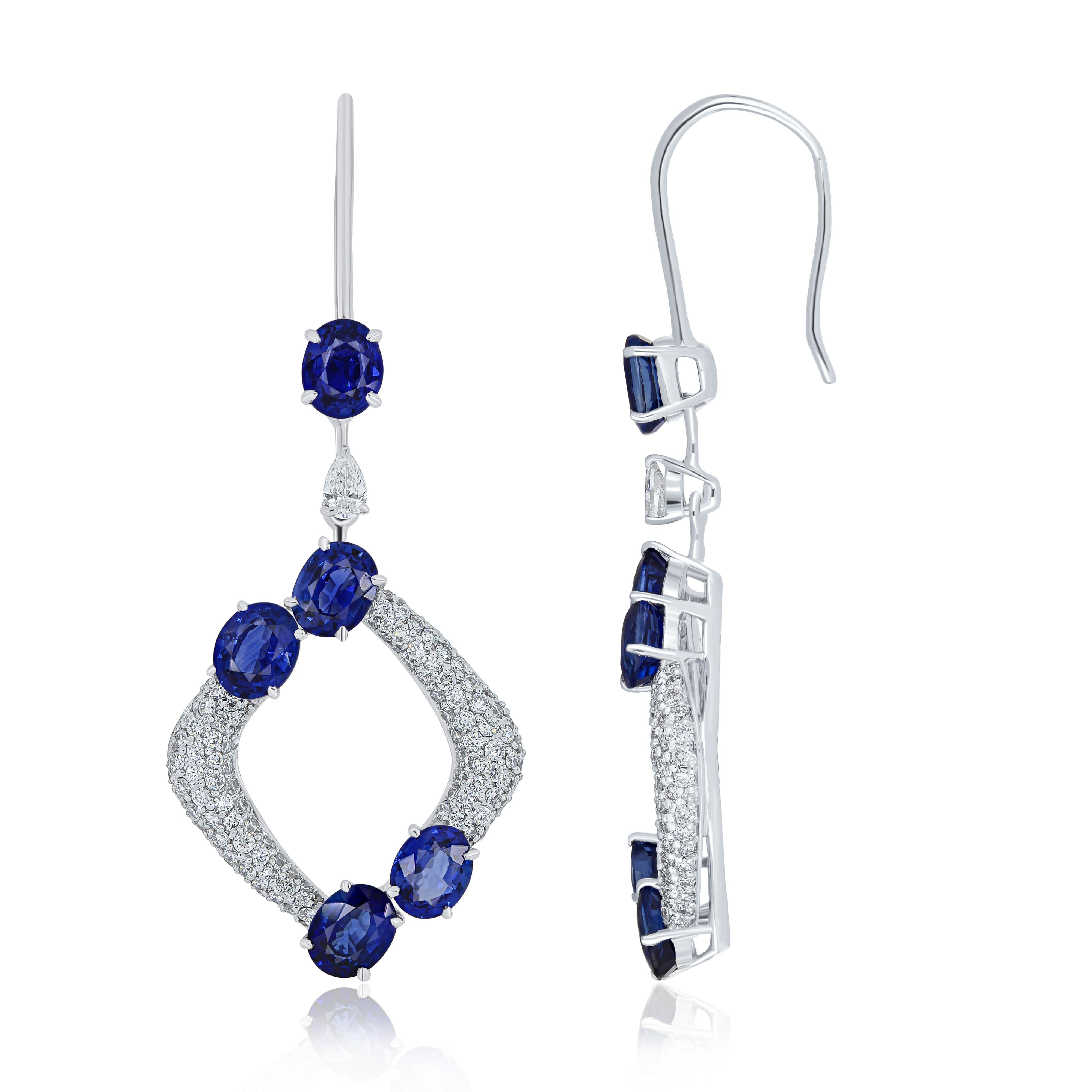 Oval Cut Blue Sapphire and Diamond Studded Earrings in 18 Karat White Gold For Sale