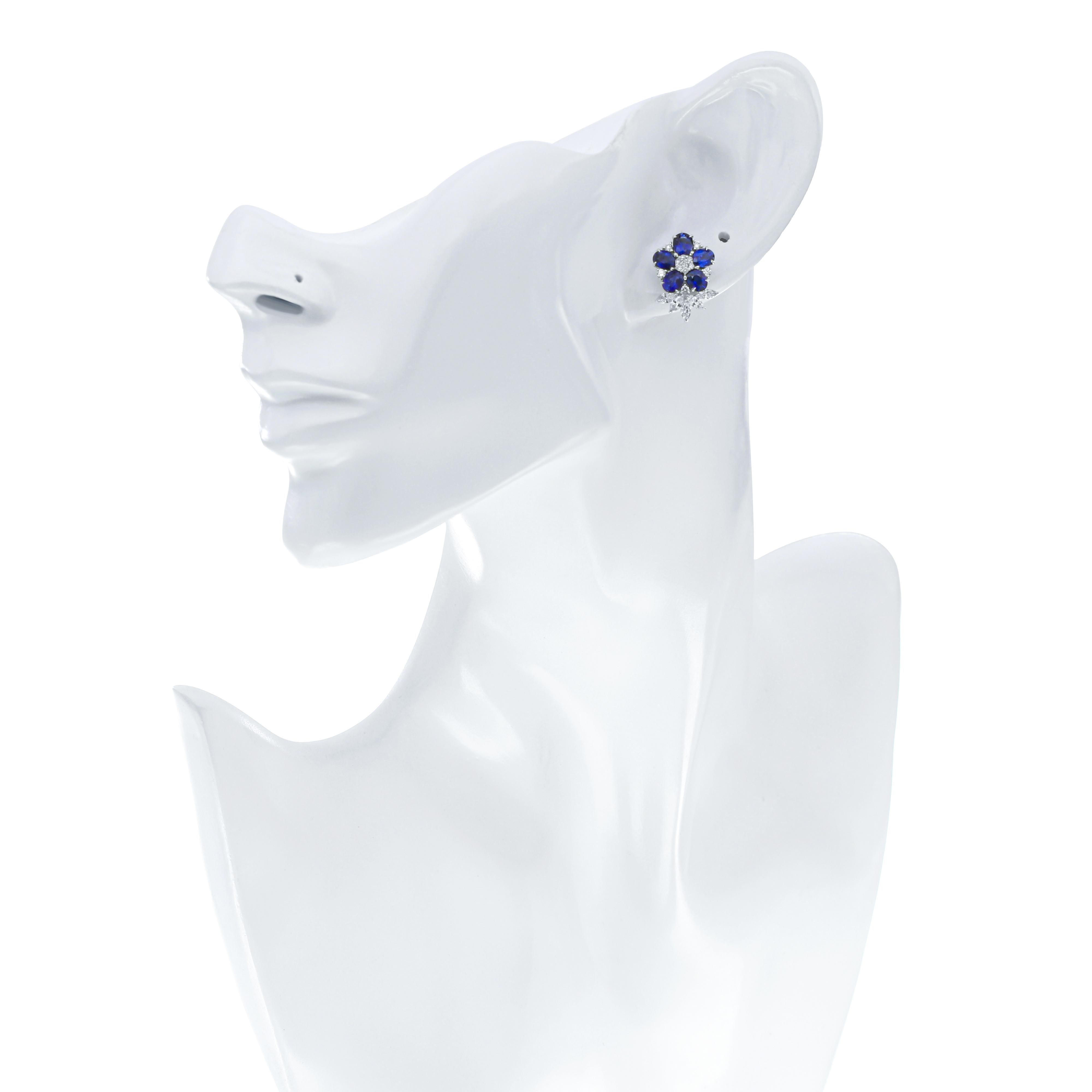 Women's Blue Sapphire And Diamond Studded Earrings in 18 Karat White Gold For Sale