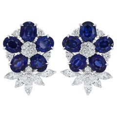 Blue Sapphire And Diamond Studded Earrings in 18 Karat White Gold