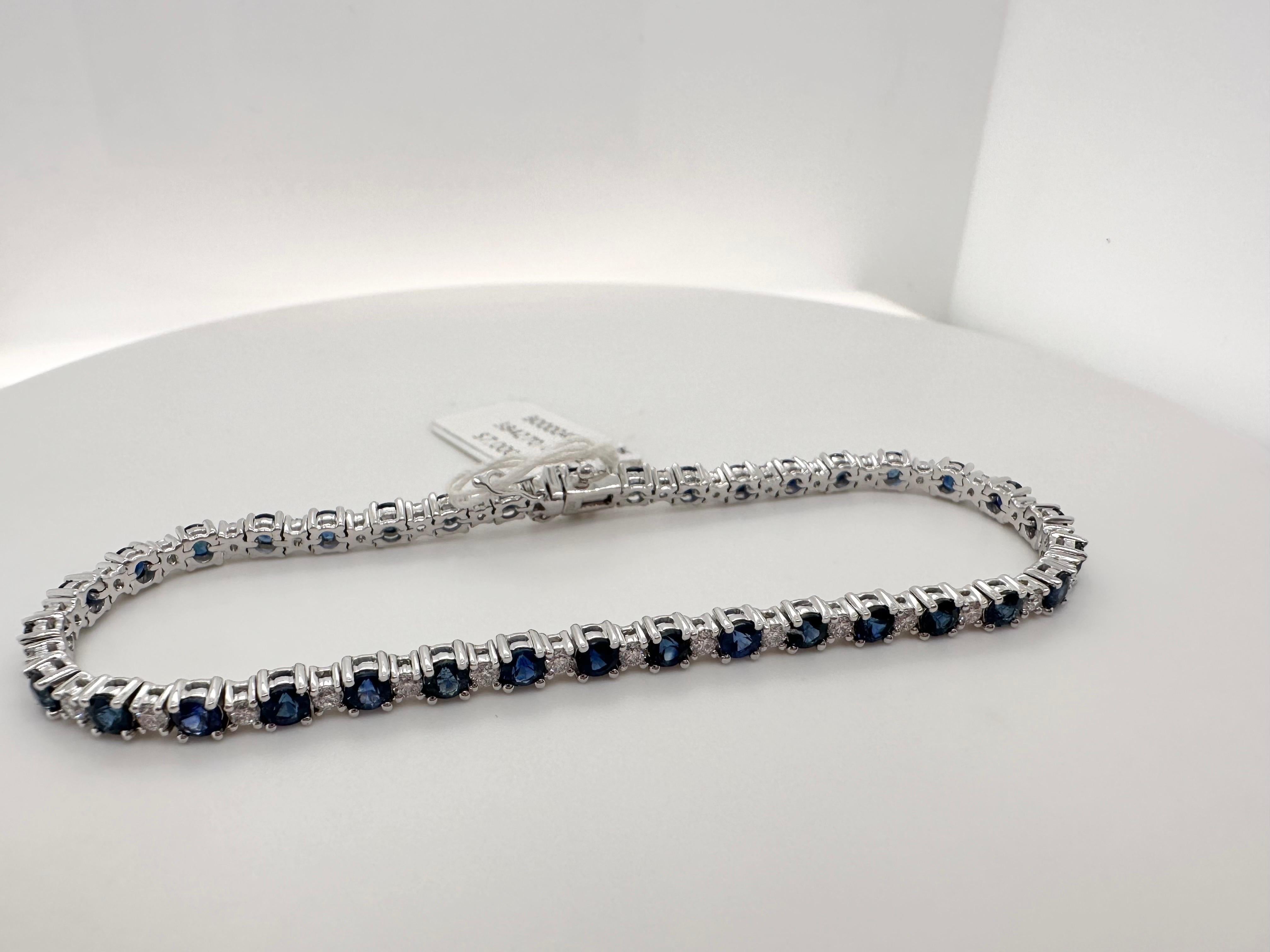 Round Cut Blue sapphire and diamond tennis bracelet 18KT white gold 7