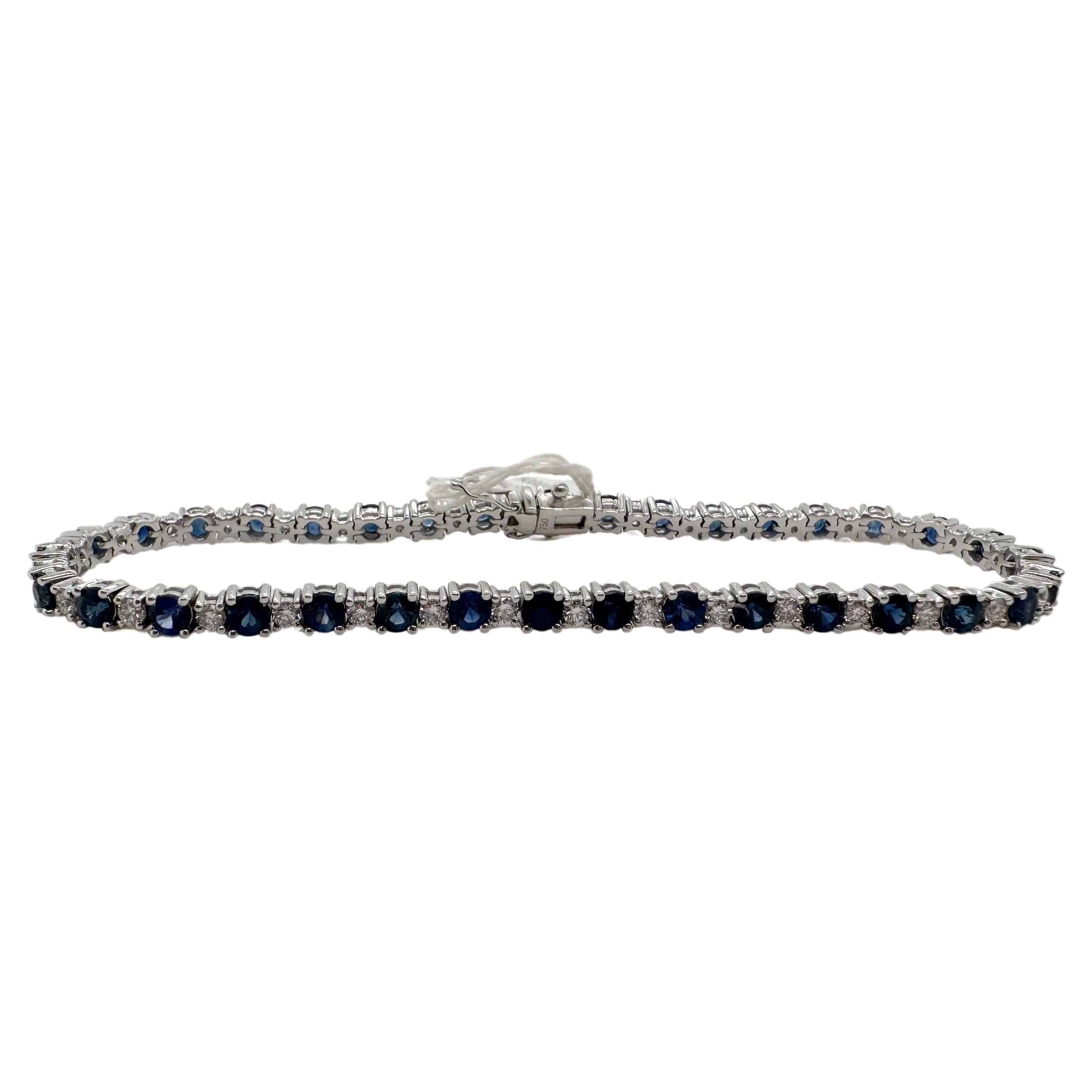 Blue sapphire and diamond tennis bracelet 18KT white gold 7"