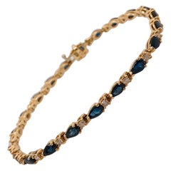 Blue Sapphire and Diamond Tennis Bracelet in 14K Yellow Gold, Five Star Jewelry