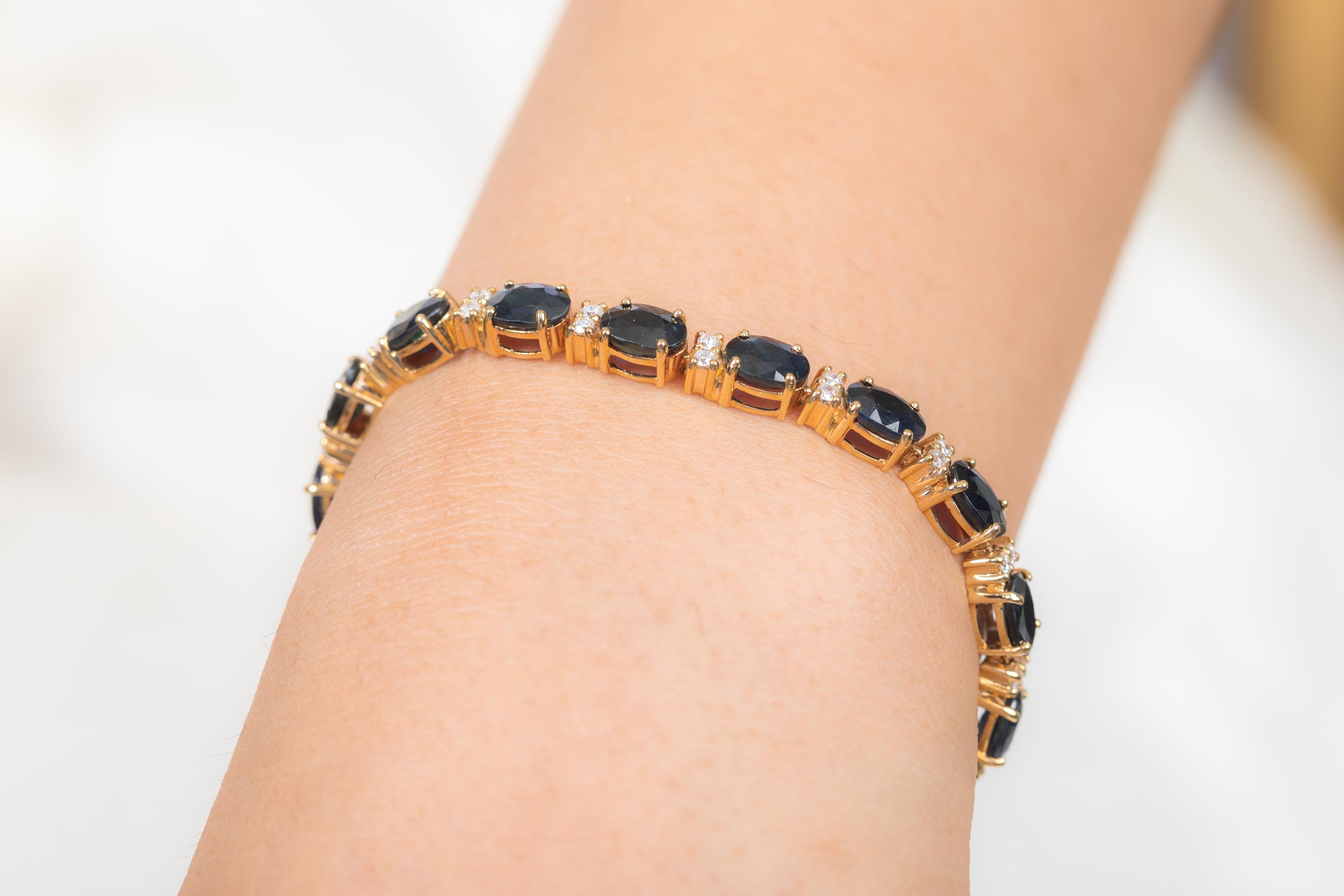 Oval Cut Deep Blue Sapphire and Diamond Tennis Bracelet in 14k Solid Yellow Gold For Sale