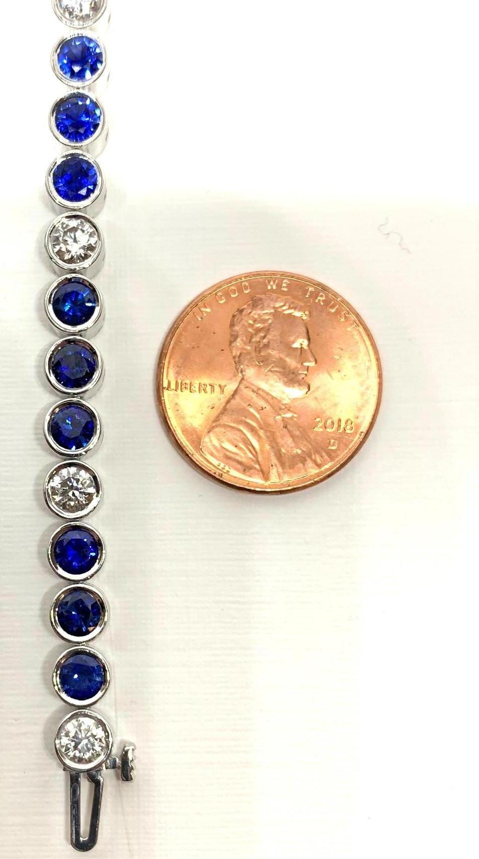 Women's Blue Sapphire and Diamond Tennis Bracelet, White Gold Bezel, 6.42 Carats Total For Sale