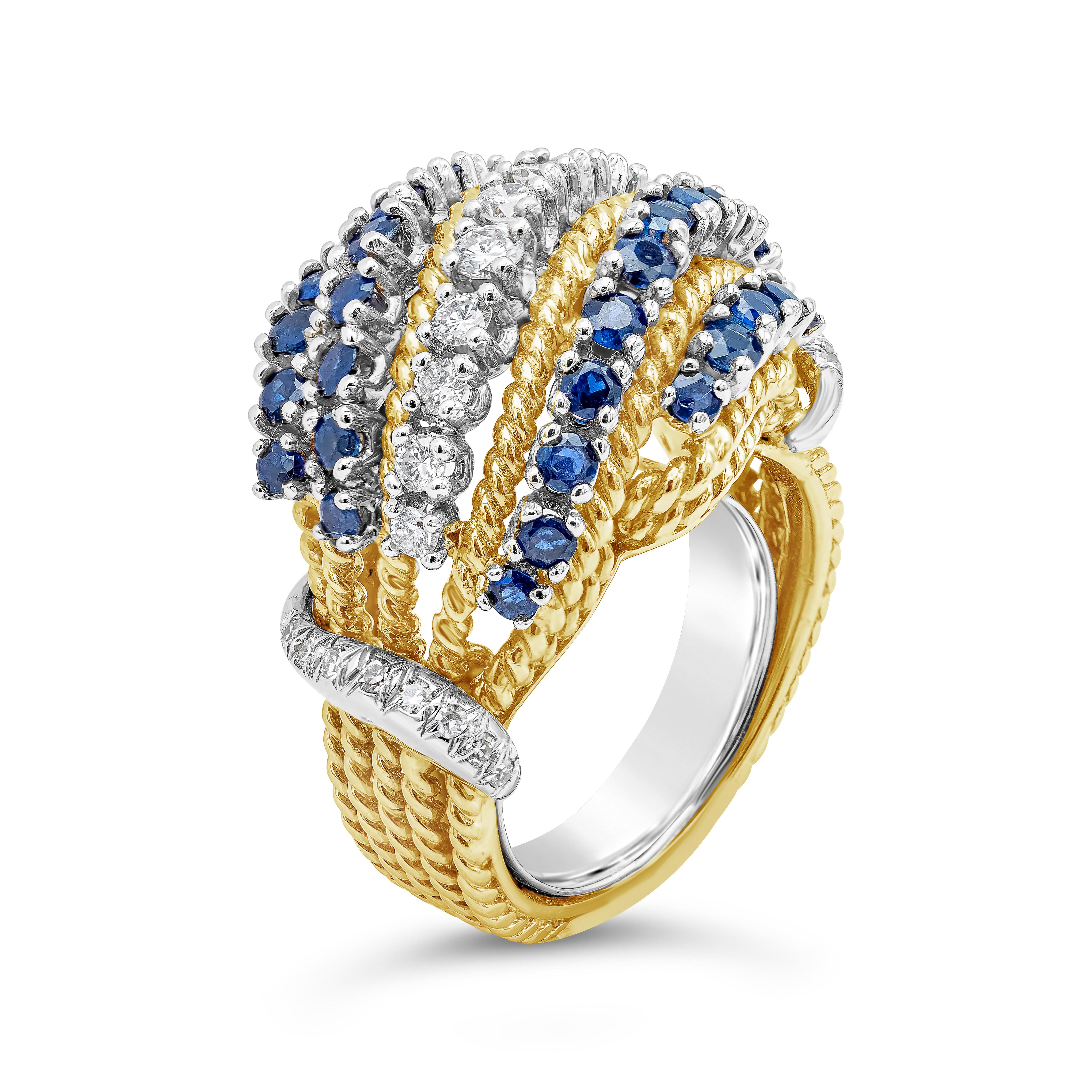 A fashionable cocktail ring featuring a row of round cut diamond in the middle, accented on both sides with two rows of blue sapphires. Sapphires weigh approximately 1.30 carats total. Diamonds weigh approximately 0.60 carats total. Finely made in