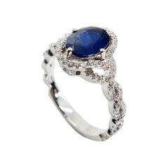 Blue Sapphire and Diamond Twist Ring, 18 Karat White Gold