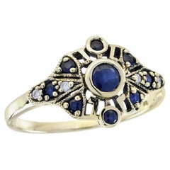 Anillo en racimo estilo vintage de zafiro azul y diamante en oro amarillo macizo de 9 quilates
