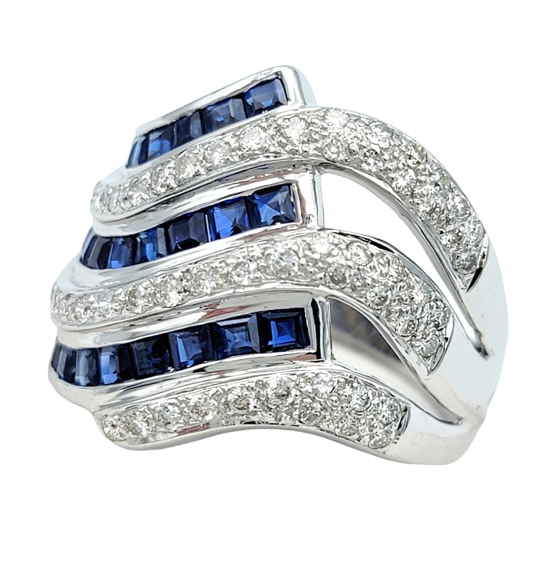 Contemporary Blue Sapphire and Diamond Wave Design Wide Band Ring Set in 18 Karat White Gold For Sale