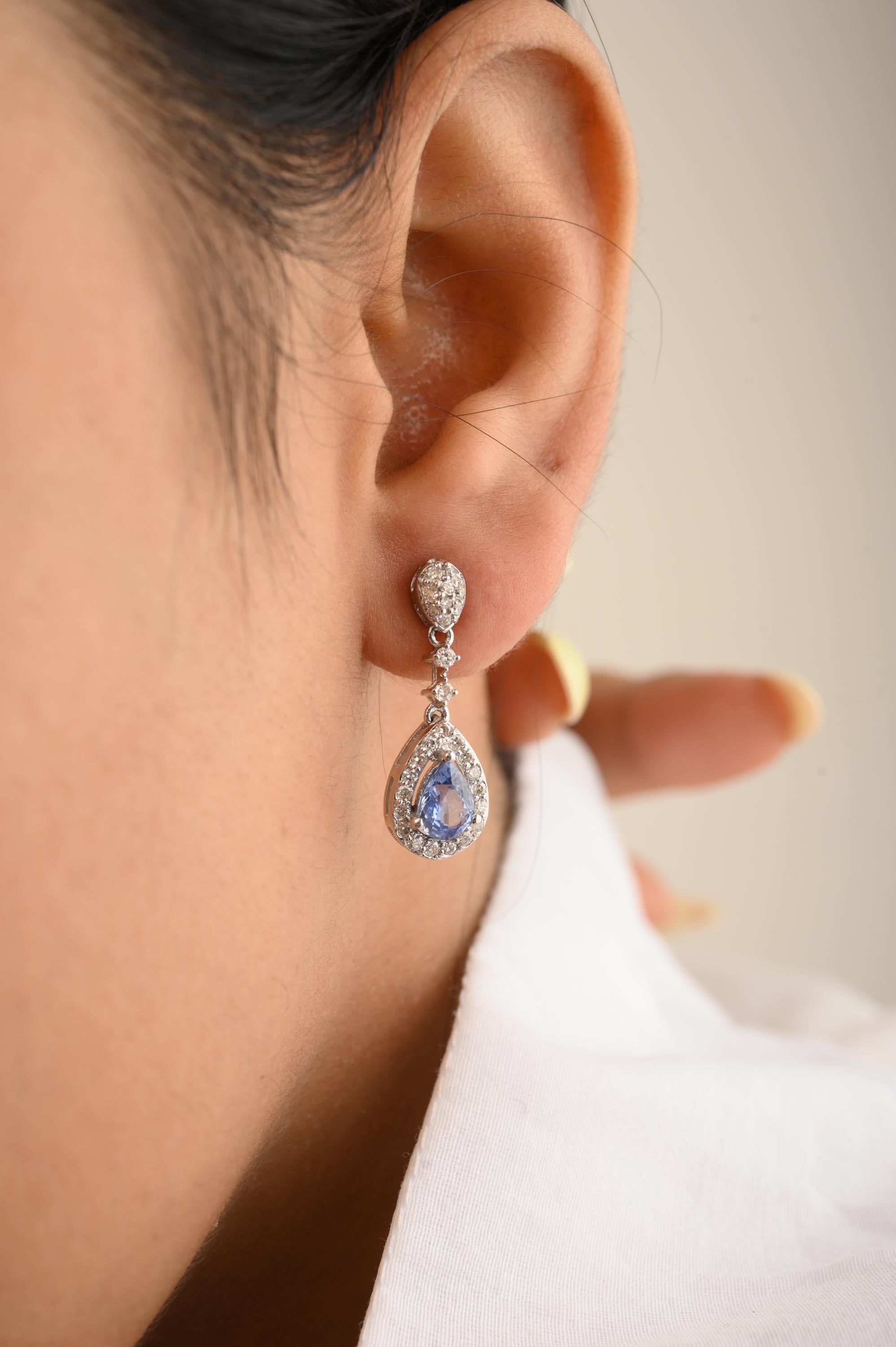 Genuine Blue Sapphire and Diamond Wedding Earrings in 14K Gold to make a statement with your look. You shall need stud earrings to make a statement with your look. These earrings create a sparkling, luxurious look featuring pear cut