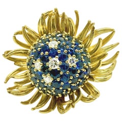 Anello da cocktail con fiore in oro giallo, zaffiro blu e diamante