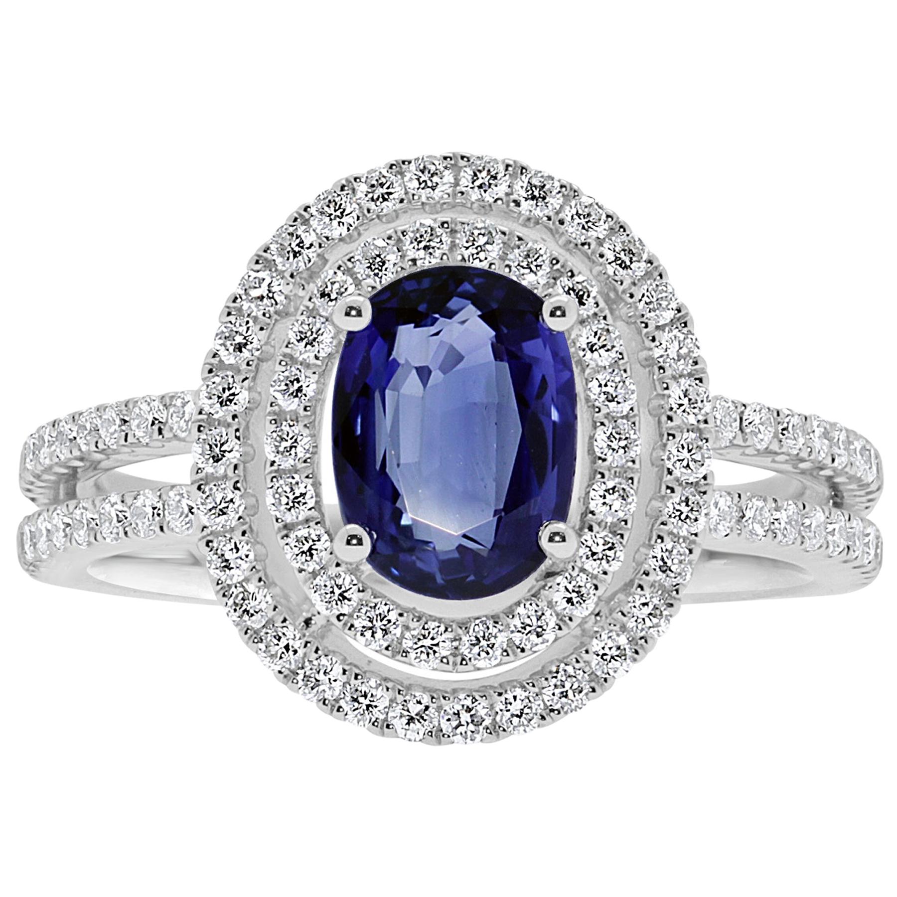 Blue Sapphire and Diamonds Double Halo Engagement Ring in 18 Karat White Gold For Sale