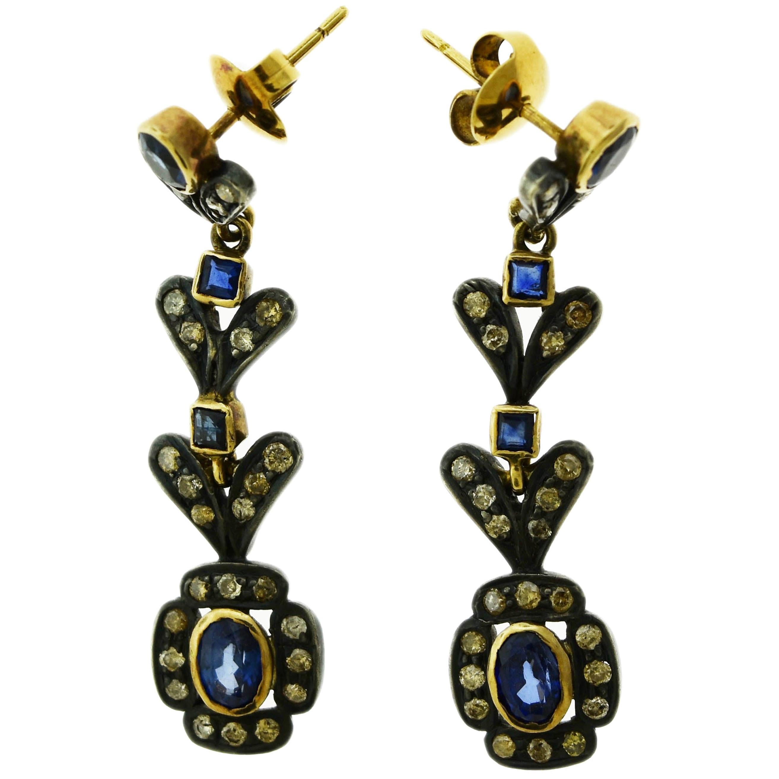 Blue Sapphire and Diamonds Set in 18 Karat Gold with Rodium Antique Earrings