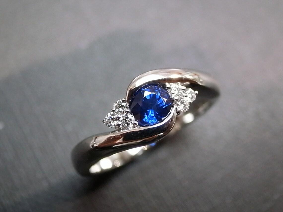 For Sale:  Blue Sapphire and Diamonds Twist Tension Engagement Ring in 18K White Gold 3