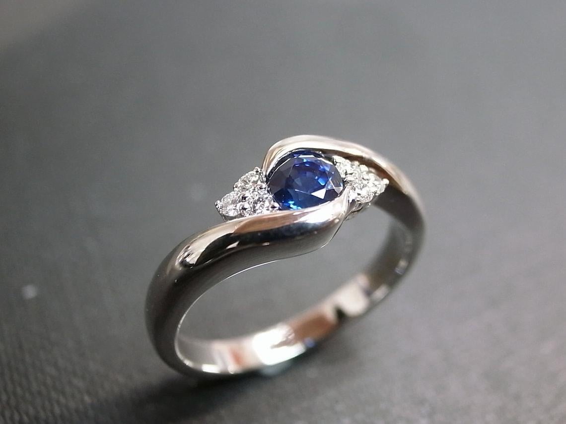 For Sale:  Blue Sapphire and Diamonds Twist Tension Engagement Ring in 18K White Gold 6