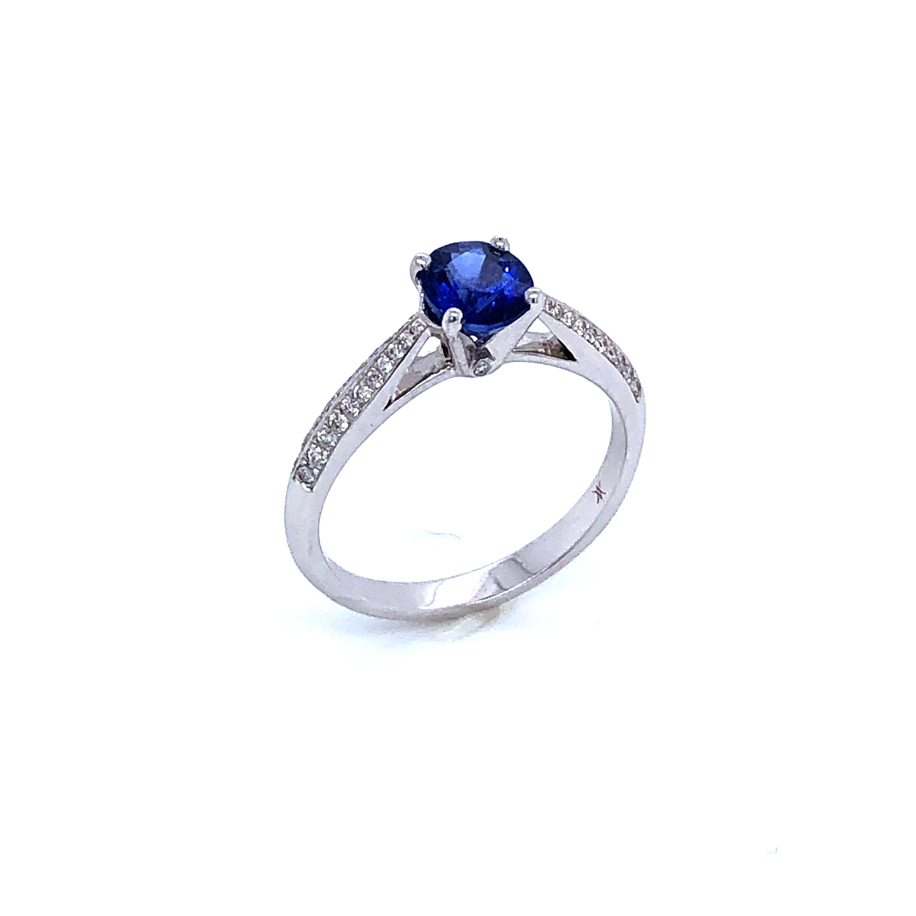 Oval Cut Ring Blue Sapphire Diamonds White Gold 18 Karat  For Sale