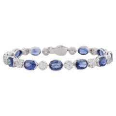 Blue Sapphire and Flower Diamond Tennis Bracelet in 18K White Gold