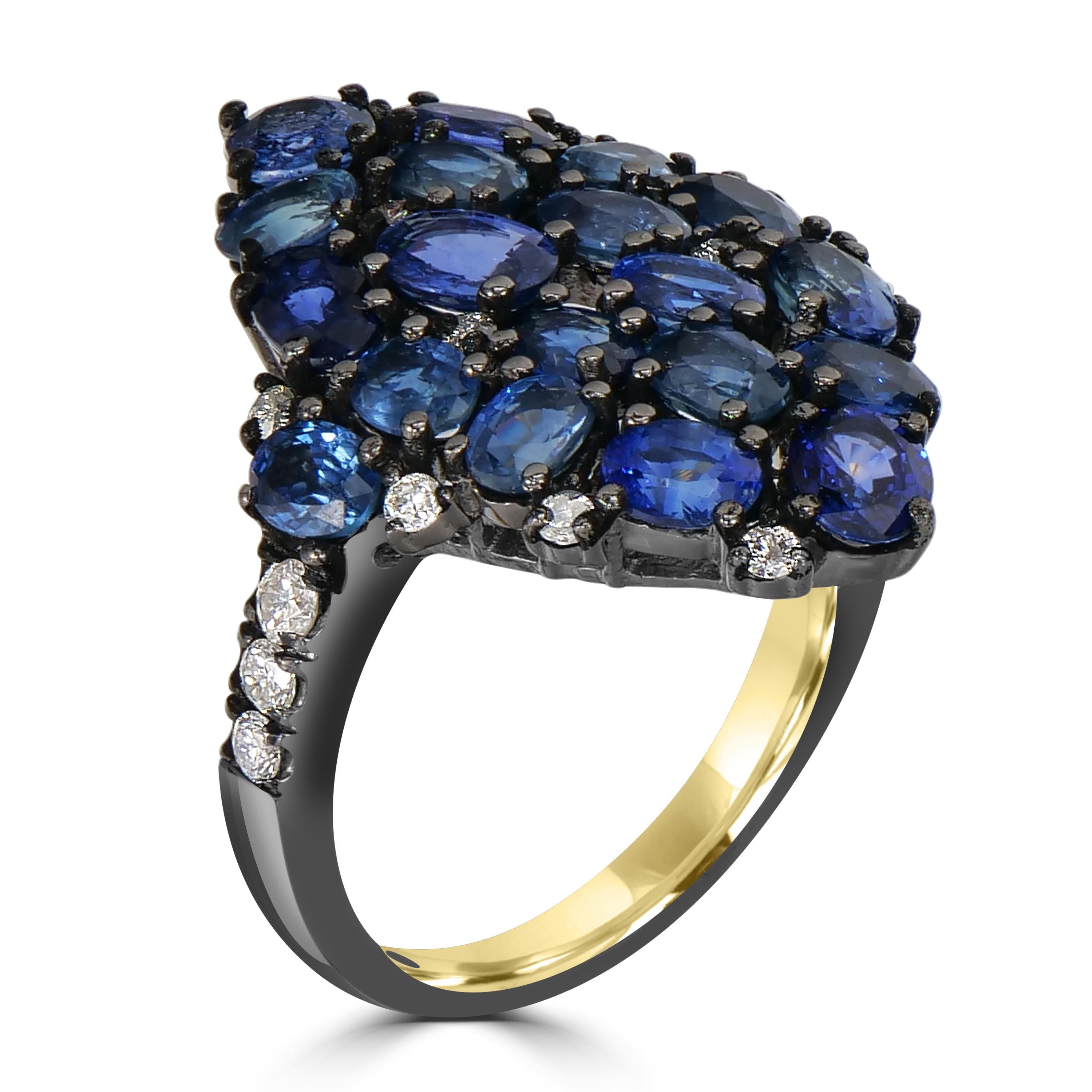 Introducing our captivating Victorian Cluster Ring, a true masterpiece that combines the deep allure of blue sapphires and the unique charm of light brown diamonds. Crafted in a luxurious 18K/925 gold setting with black prongs and shank, this ring
