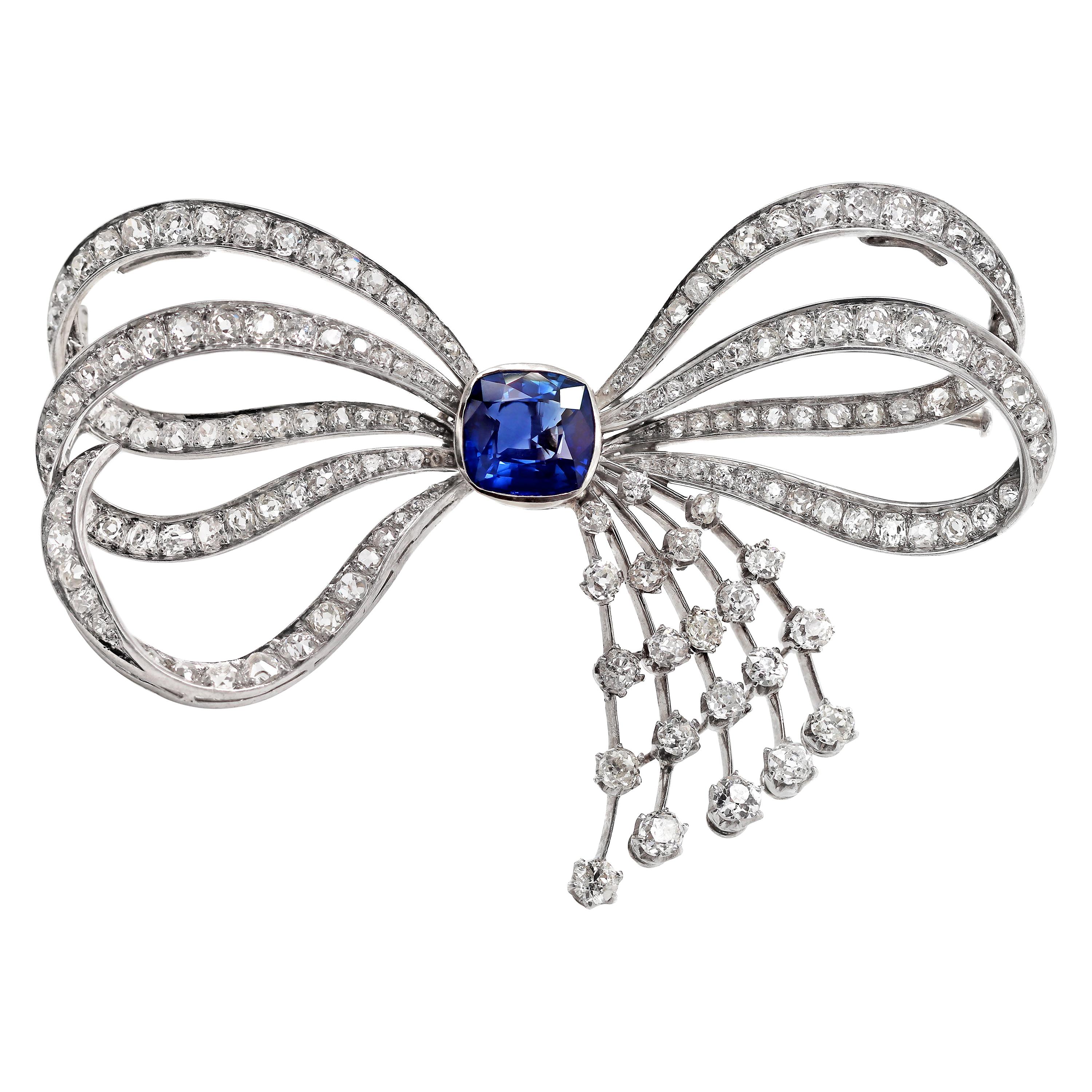 Blue Sapphire and Old Mine Cut Diamond Platinum Bow Spray Brooch, circa 1930s