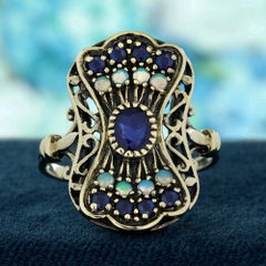 Blue Sapphire and Opal Vintage Style Peacock Cocktail Ring in  9K Gold