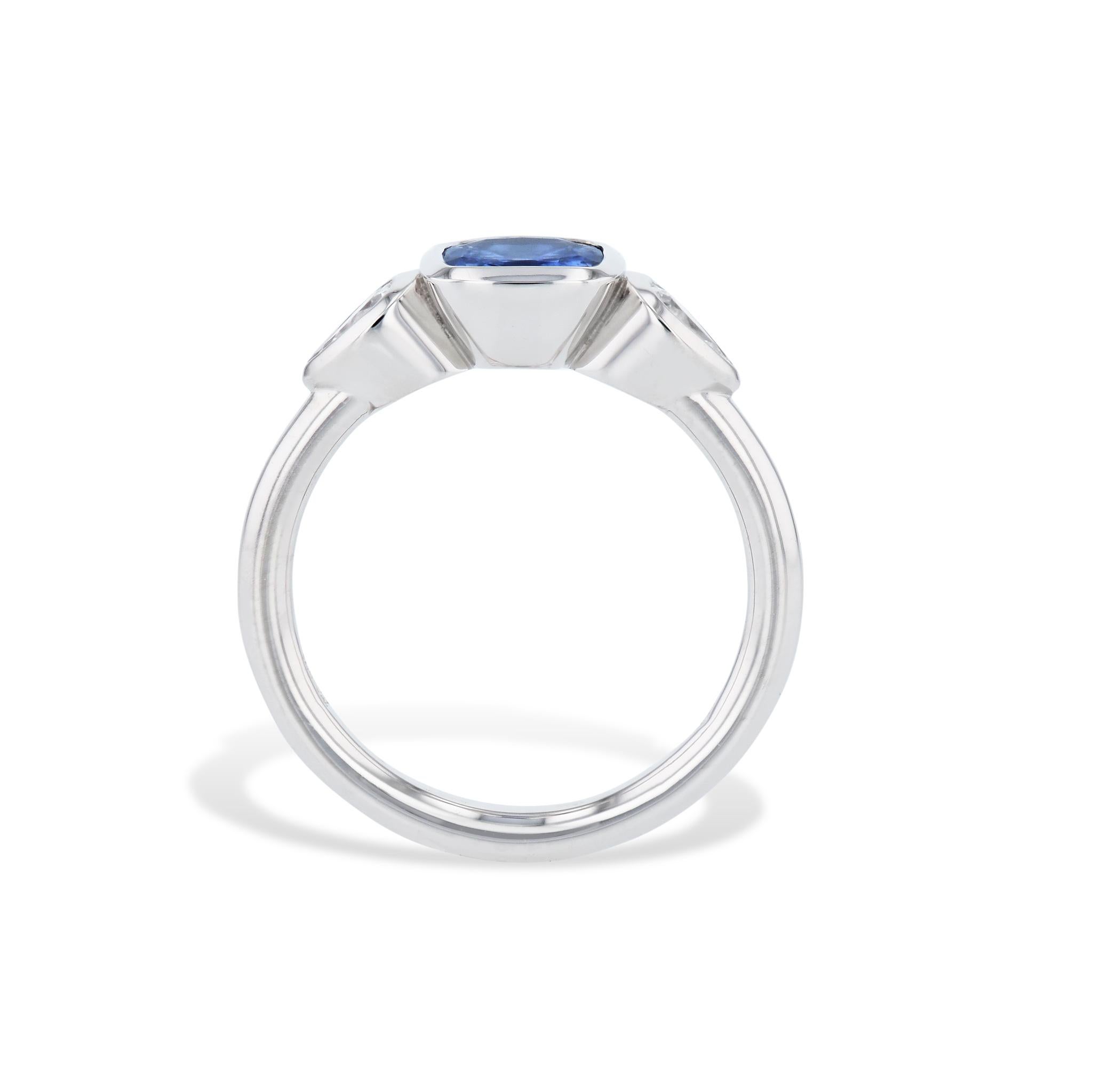 Pear Cut Blue Sapphire and Pear Shaped Diamonds Platinum Ring For Sale