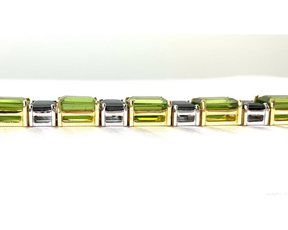 Emerald Cut Blue Sapphire and Peridot Emerald-Cut, White and Yellow Gold Tennis Bracelet