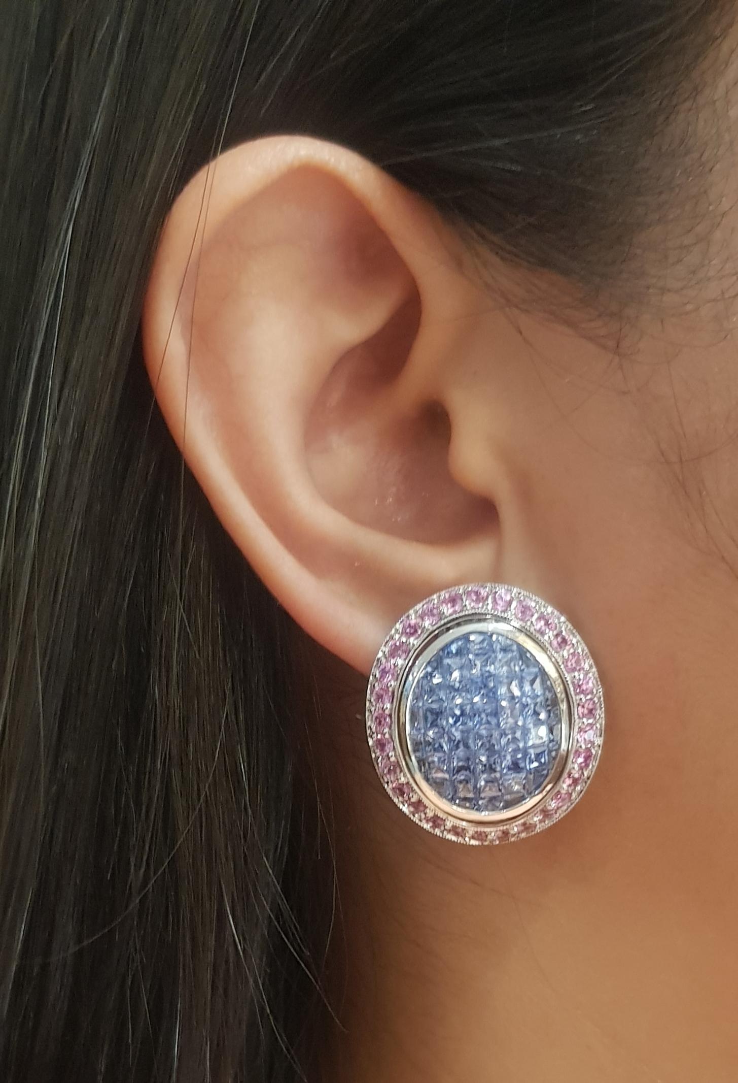 Blue Sapphire 12.40 carats and Pink Sapphire 3.54 carats Earrings set in 18K White Gold Settings

Width: 2.5 cm 
Length: 2.8 cm
Total Weight: 31.06 grams

