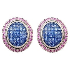 Boucles d'oreilles en saphir bleu et saphir rose montées sur or blanc 18 carats