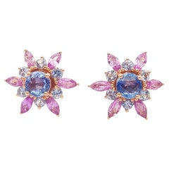 Boucles d'oreilles saphir bleu et saphir rose en or rose 18 carats