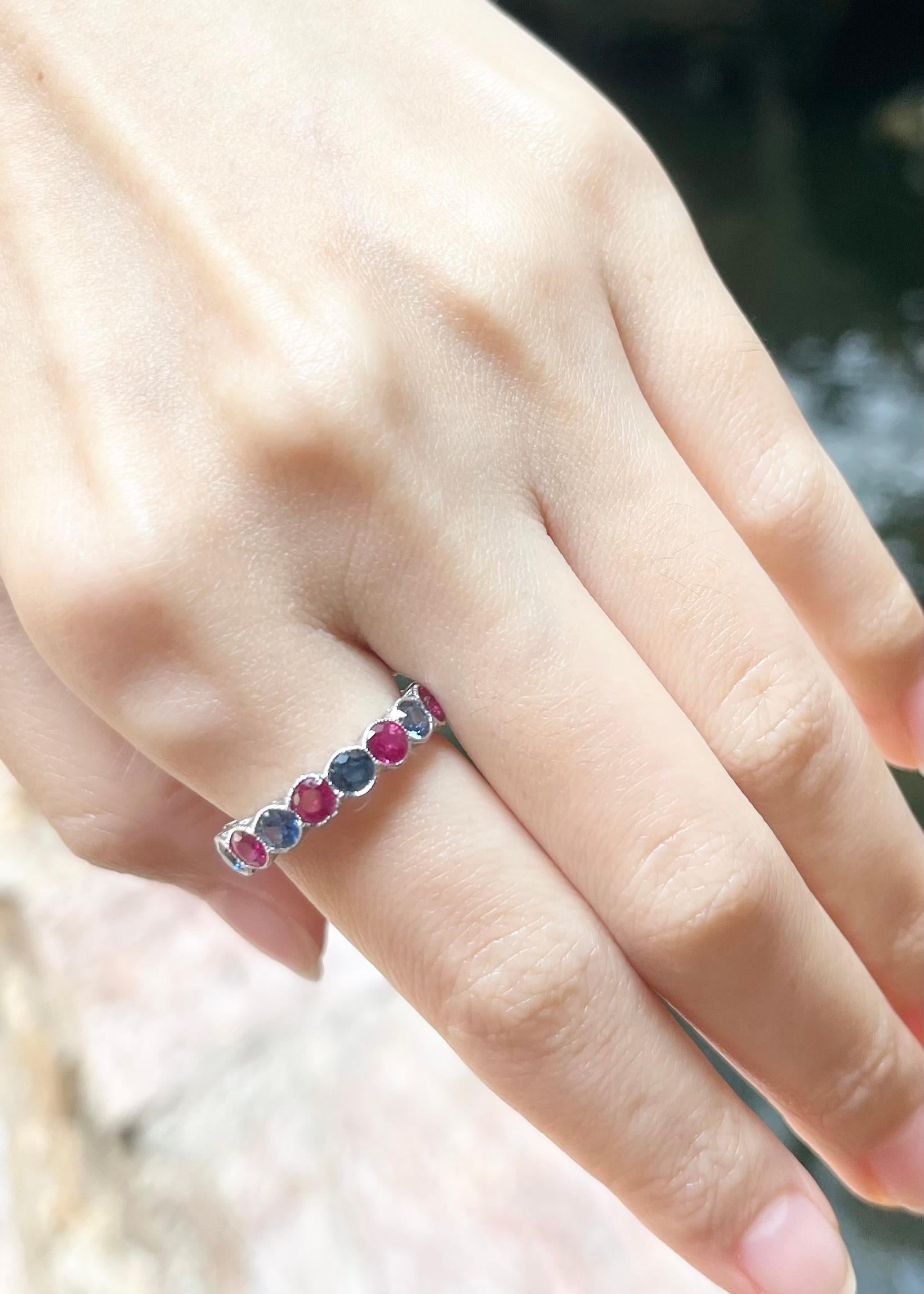 Contemporary Blue Sapphire and Ruby Eternity Ring set in 18K White Gold Settings For Sale