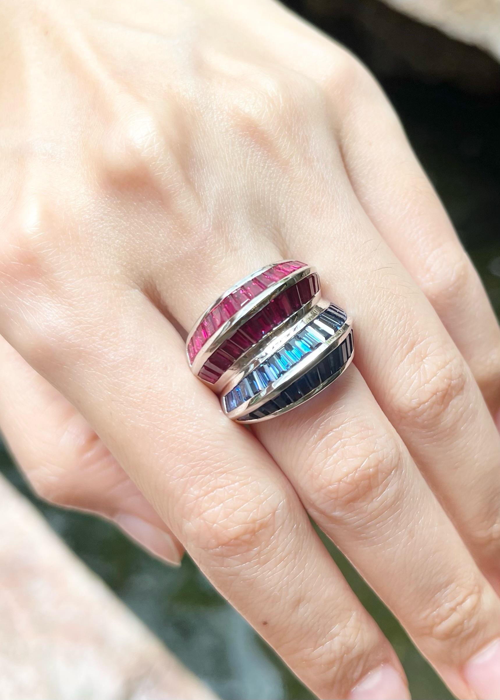 Blue Sapphire 4.80 carats and Ruby 4.15 carats Ring set in 18K White Gold Settings

Width:  2.3 cm 
Length: 1.9 cm
Ring Size: 55
Total Weight: 13.11 grams

